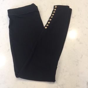 Juicy Couture black legging with gold snaps. Sz. M